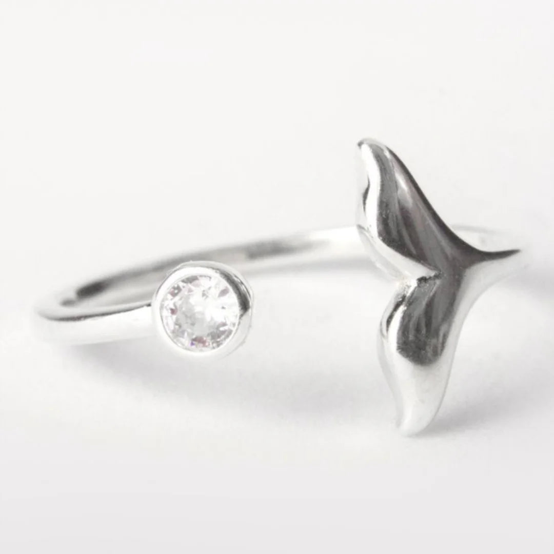 
                  
                    ANILLO COLA DE BALLENA Y ZIRCONIA
                  
                